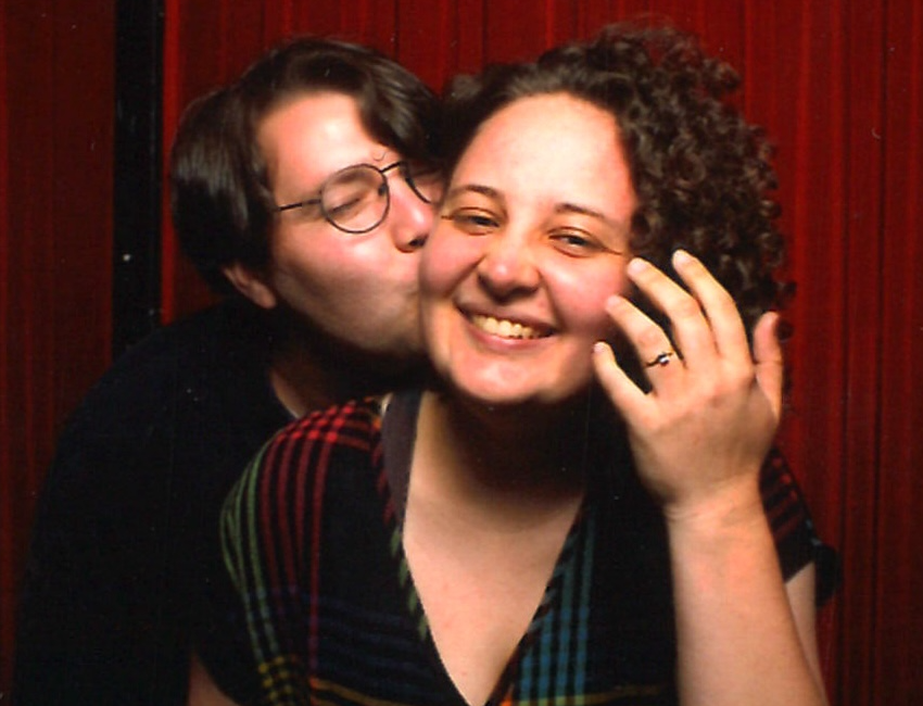 A photostrip of the couple's photobooth proposal